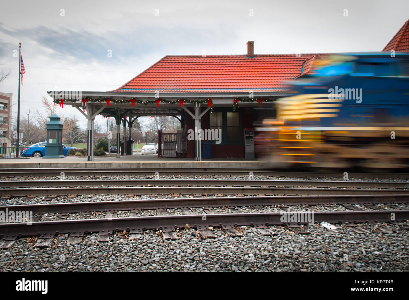 A train leaving the Manassas, Virginia station for Washington, DC that's been recently decorated for Christmas. Stock Photo