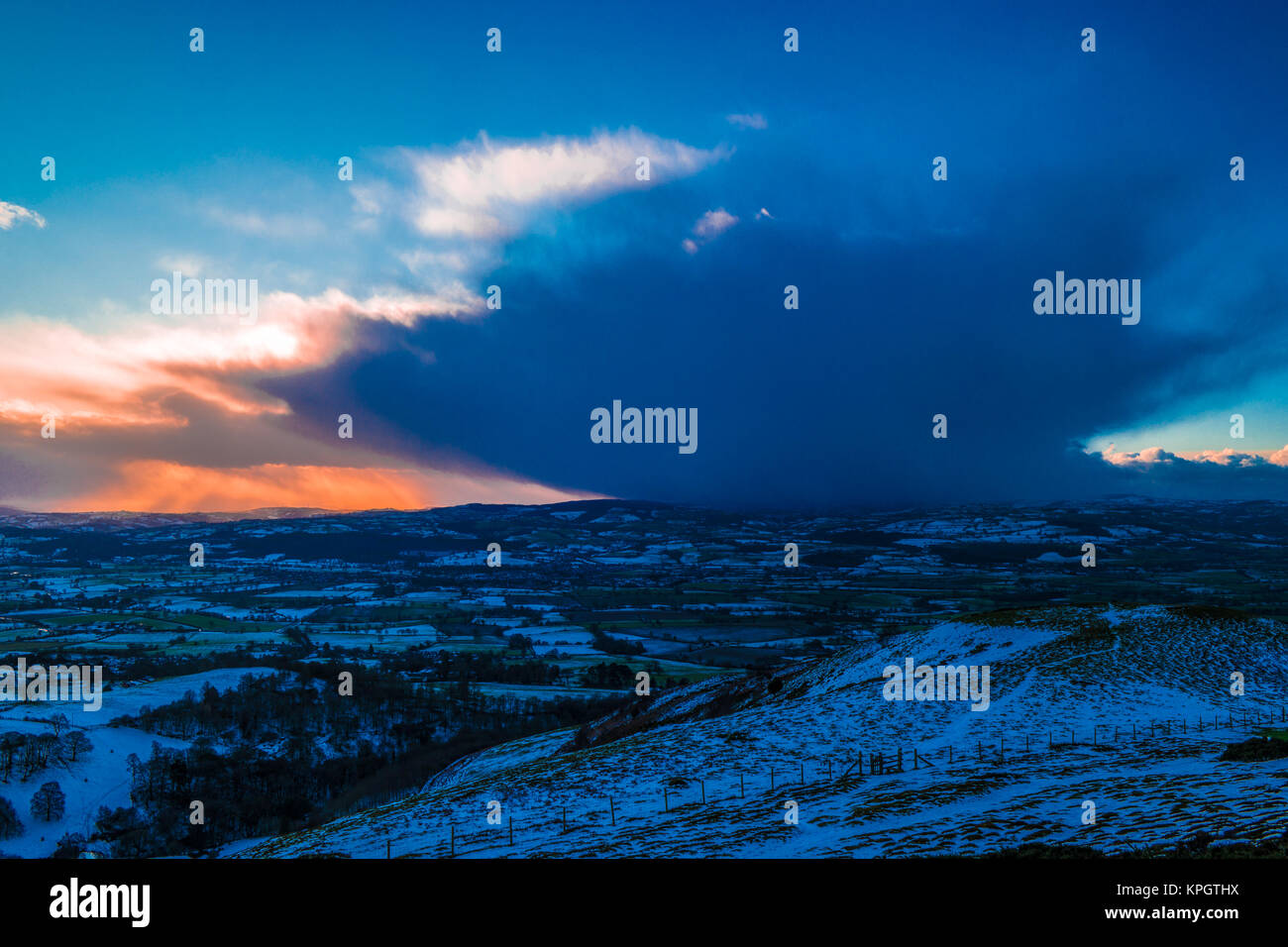 Sunset with storm cloud over the Vale of Clwyd. Stock Photo