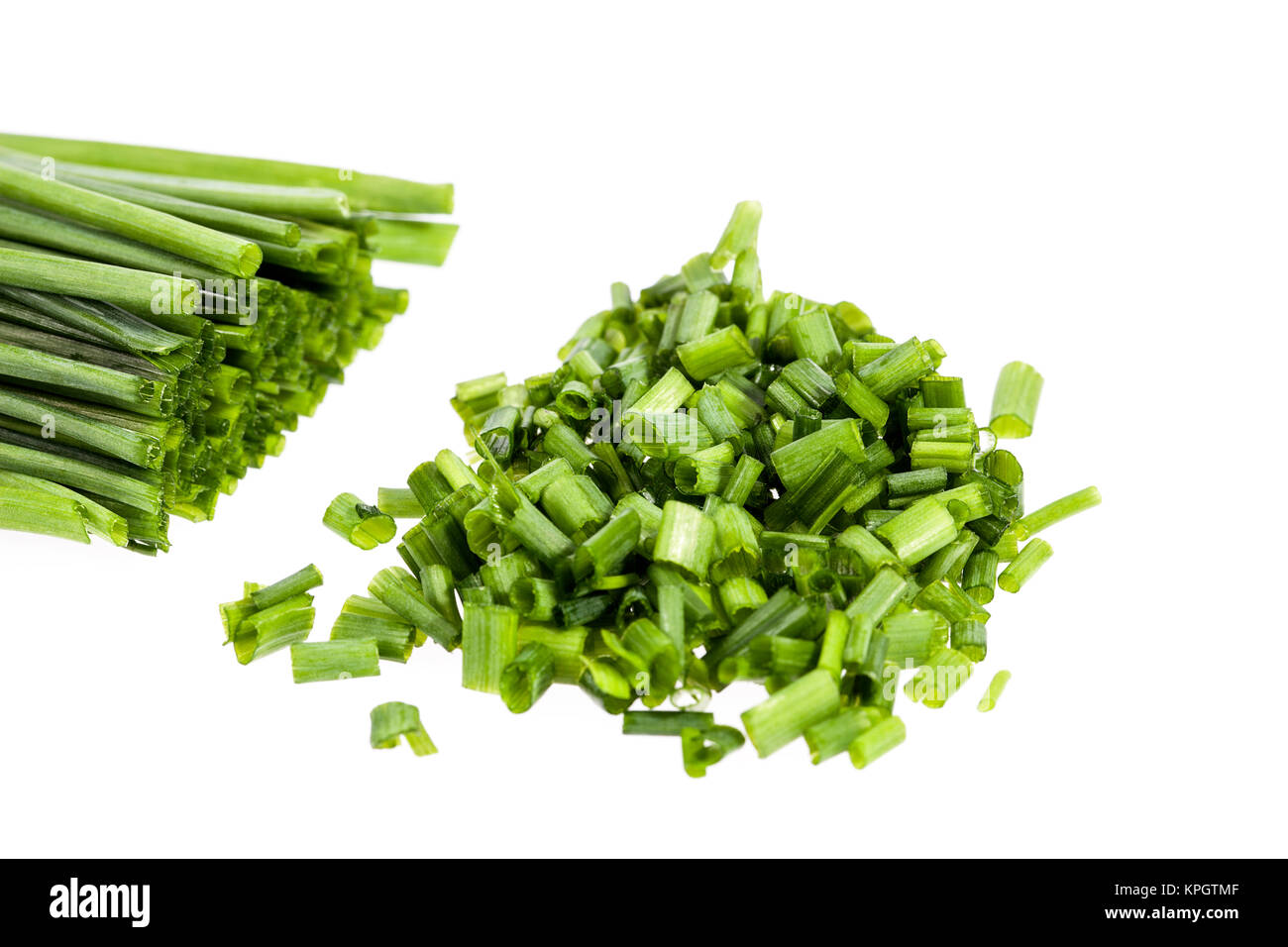 Bunch of chives on white background Stock Photo - Alamy