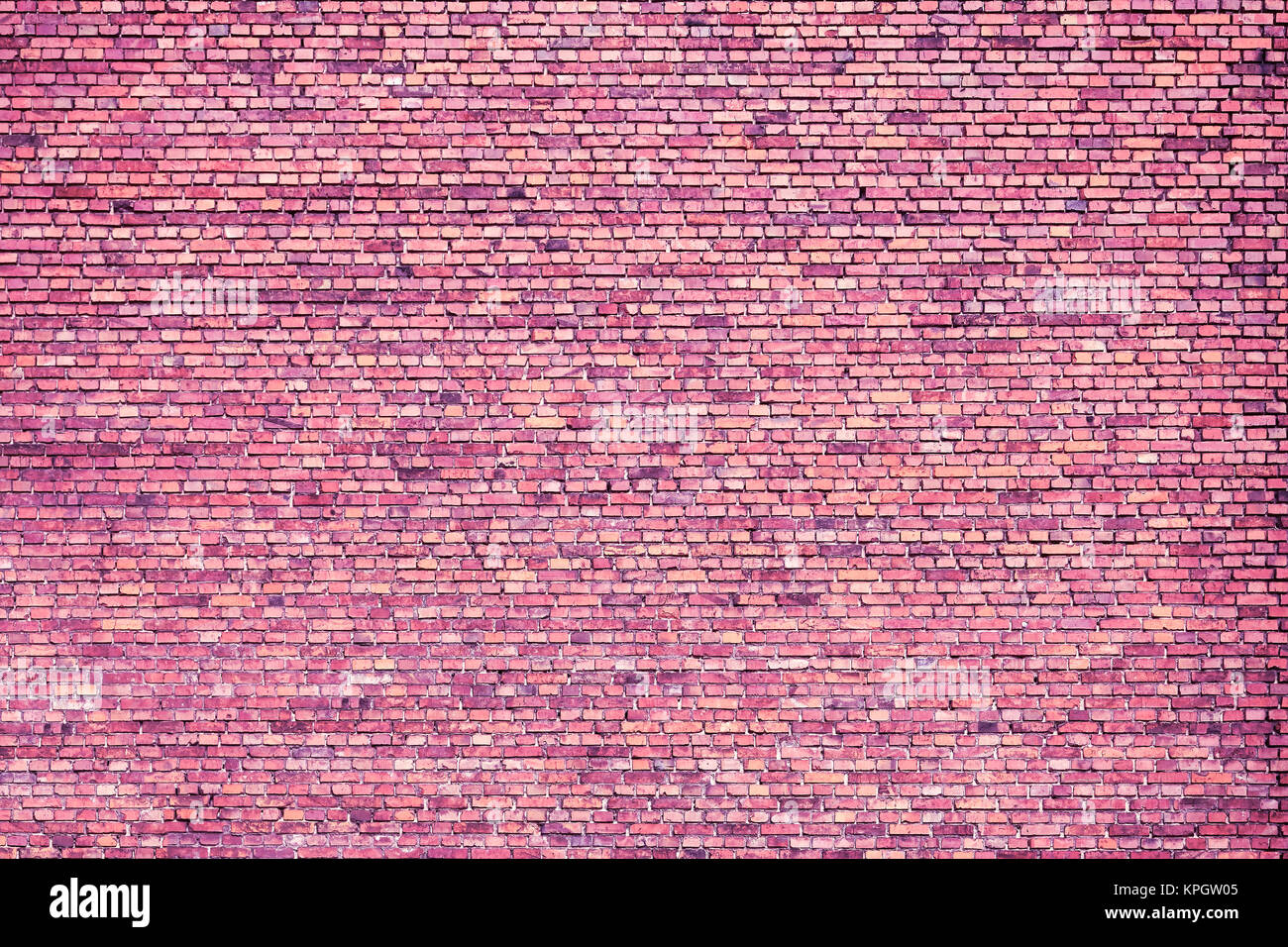 Old brick wall, Ultra Violet color toned image. Stock Photo