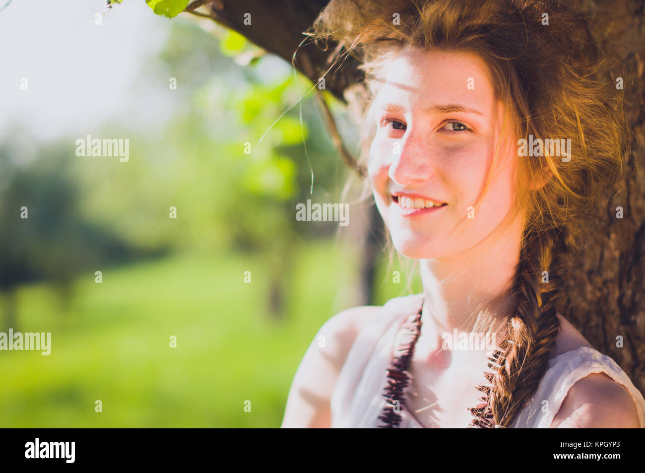 young women in cherry garden Stock Photo - Alamy