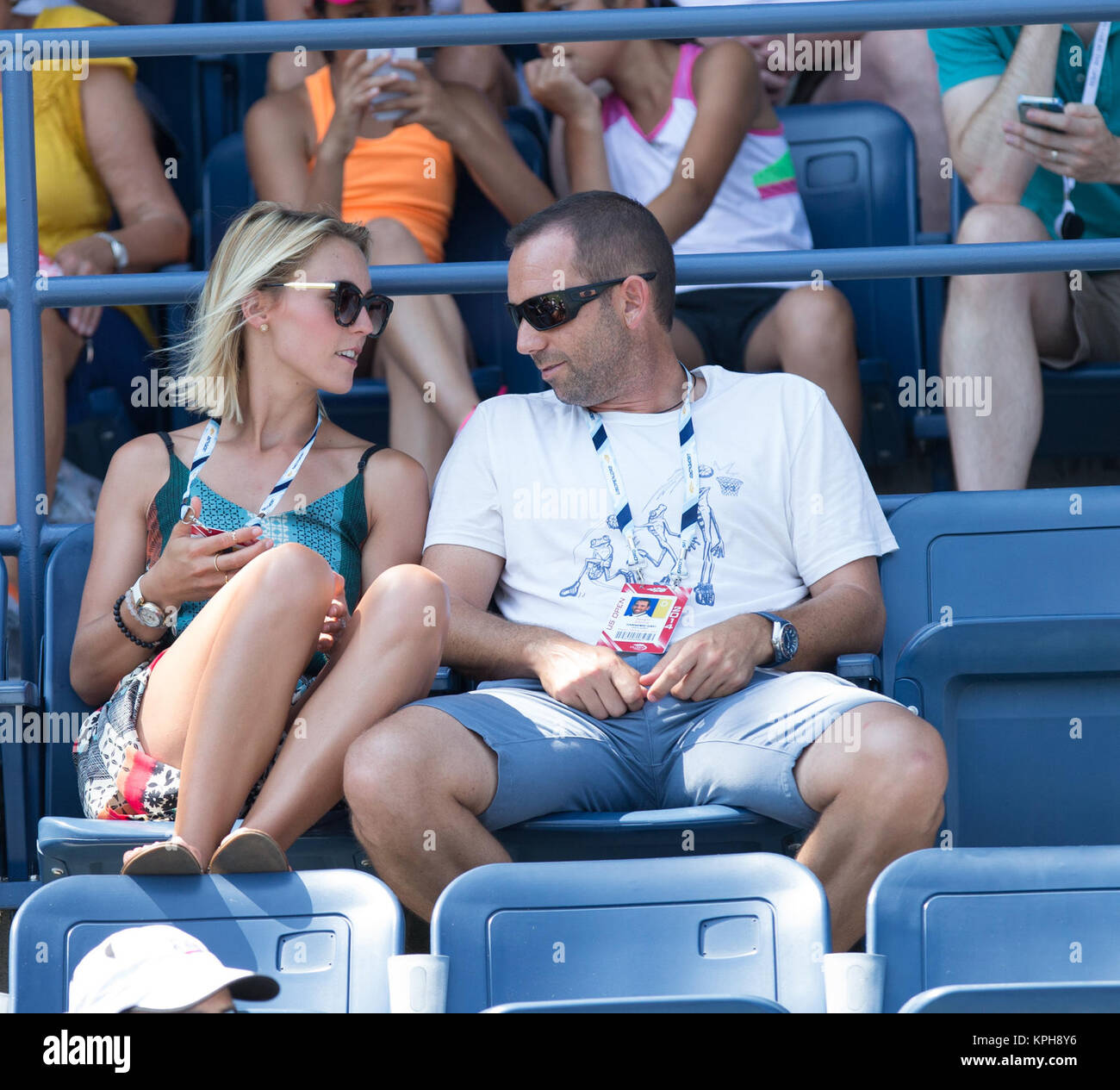 FLUSHING NY- AUGUST 27: Professional golfer from Spain Sergio Garcia with German girlfriend Katharina Boehm who was spotted wearing what appears to be a engagement ring on Arthur Ashe stadium On Day Three of the 2014 US Open at the USTA Billie Jean King National Tennis Center on August 27, 2014 in the Flushing neighborhood of the Queens borough of New York City.   People:  Sergio Garcia, Katharina Boehm Stock Photo