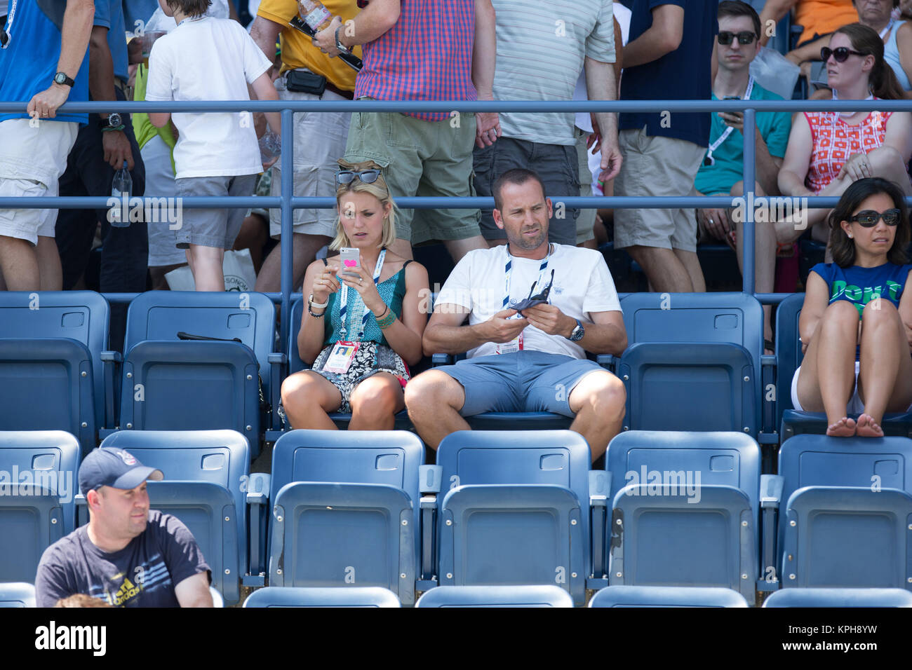 FLUSHING NY- AUGUST 27: Professional golfer from Spain Sergio Garcia with German girlfriend Katharina Boehm who was spotted wearing what appears to be a engagement ring on Arthur Ashe stadium On Day Three of the 2014 US Open at the USTA Billie Jean King National Tennis Center on August 27, 2014 in the Flushing neighborhood of the Queens borough of New York City.   People:  Sergio Garcia, Katharina Boehm Stock Photo