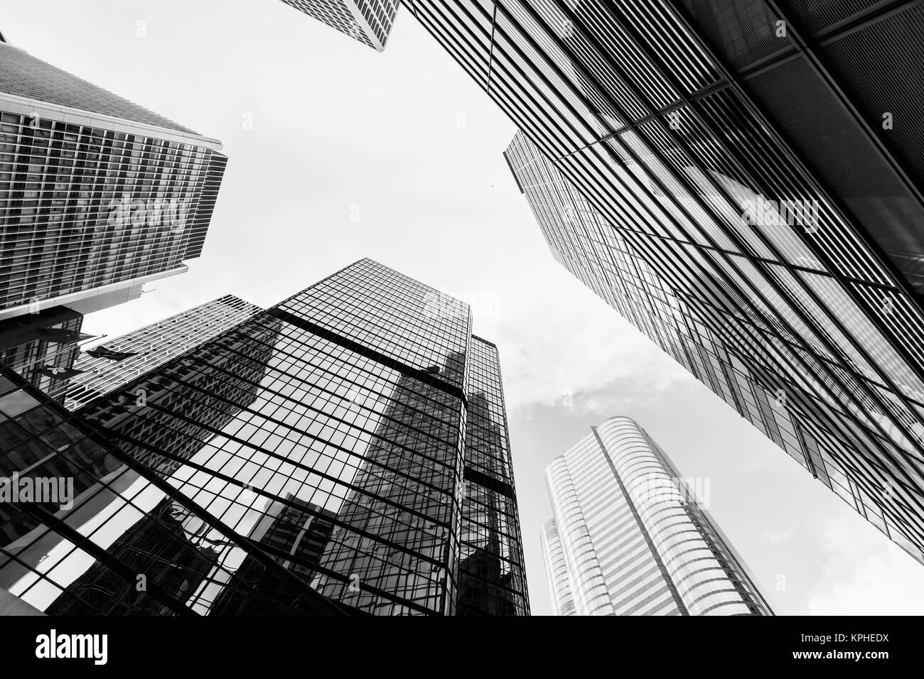Urban skyline with skyscrapers. High-rise office buildings in city of Hong Kong. Black and white photo Stock Photo