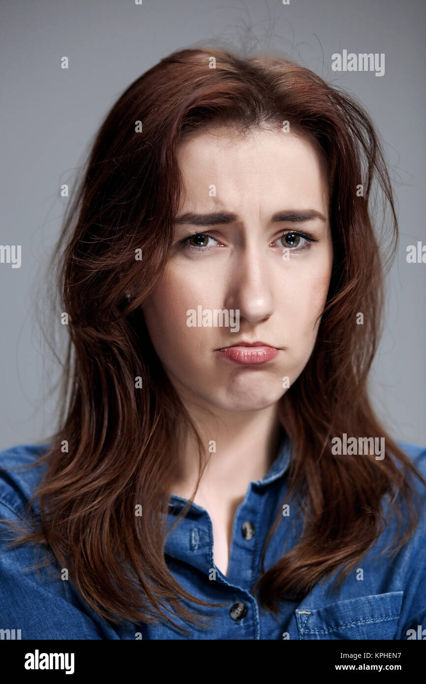 The portrait of a beautiful sad girl closeup Stock Photo