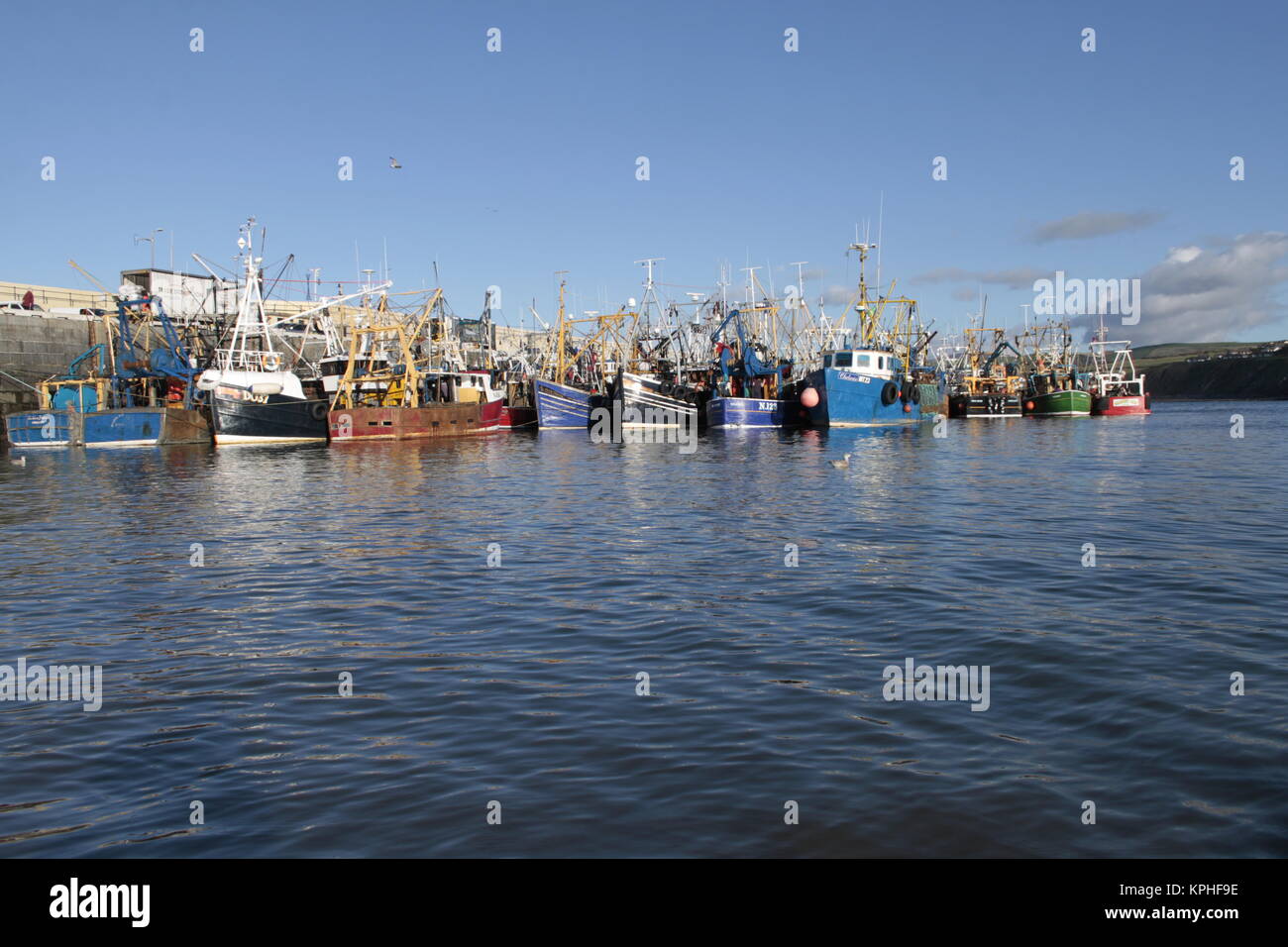 Trawler Fishing boats in Peel harbour, Isle of Man, United Kingdom. Fishing for Scallops (Queenies). Strict quotas mean the boats return to harbour. Stock Photo