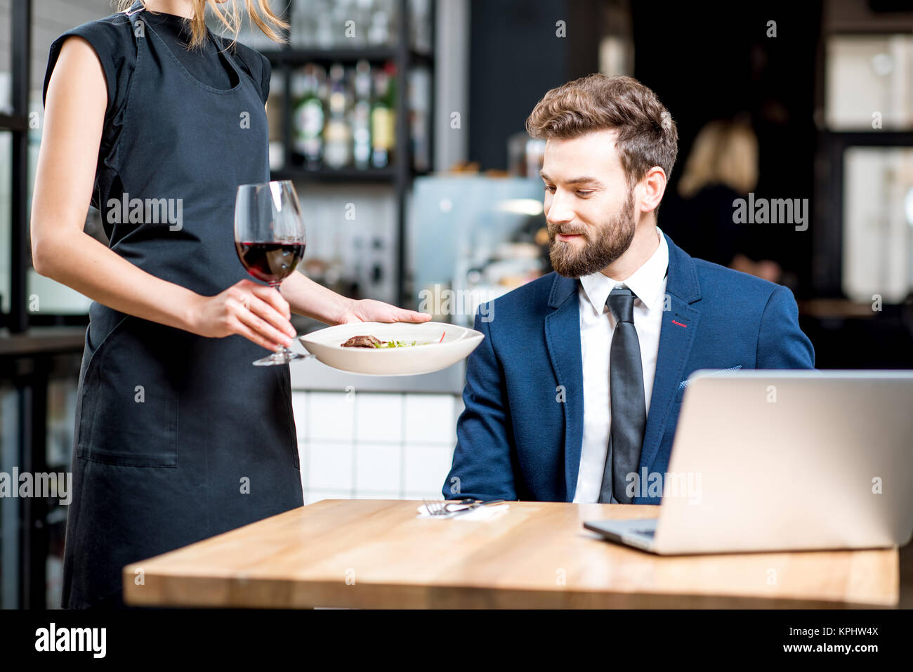 Businessman waiting for the order Stock Photo