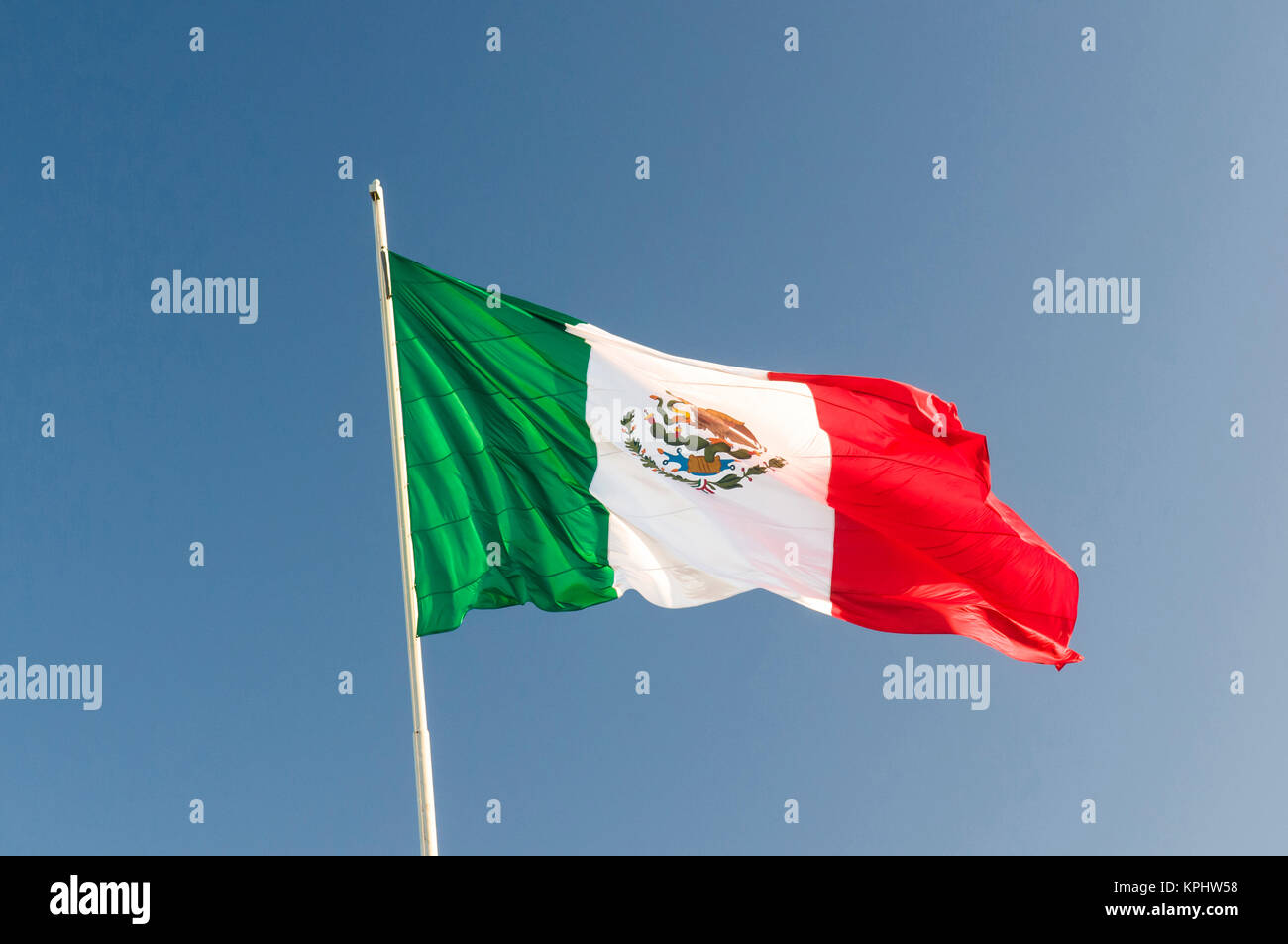 USA, Texas, Brownsville, Matamoros, Mexico. Mexican flag flying over border. Stock Photo