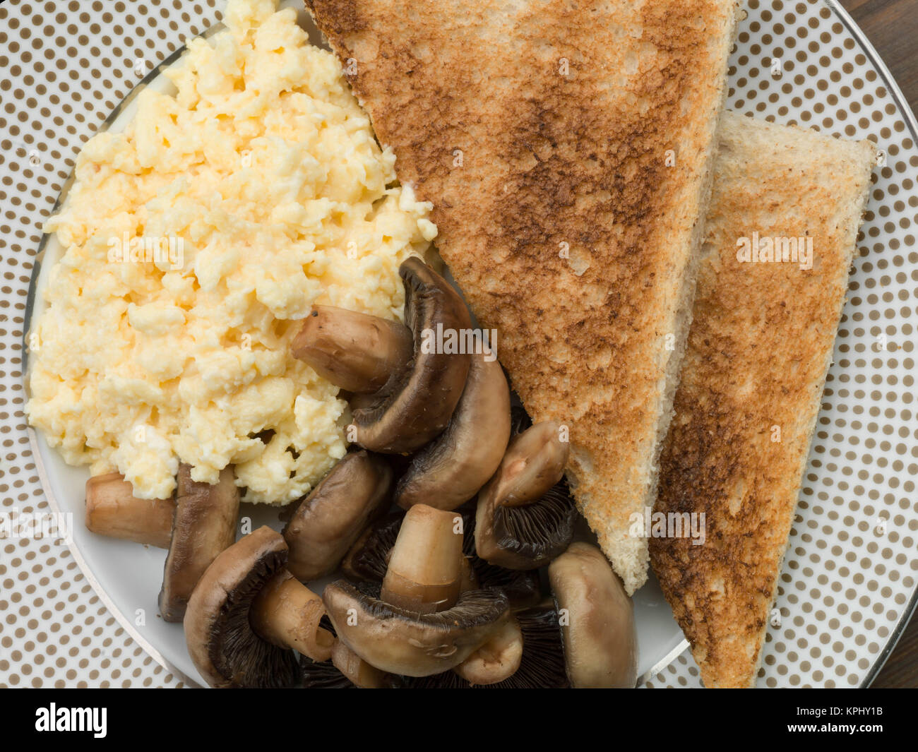 Healthy Cooked Breakfast Food of Scrambled Eggs Mushrooms and Toast
