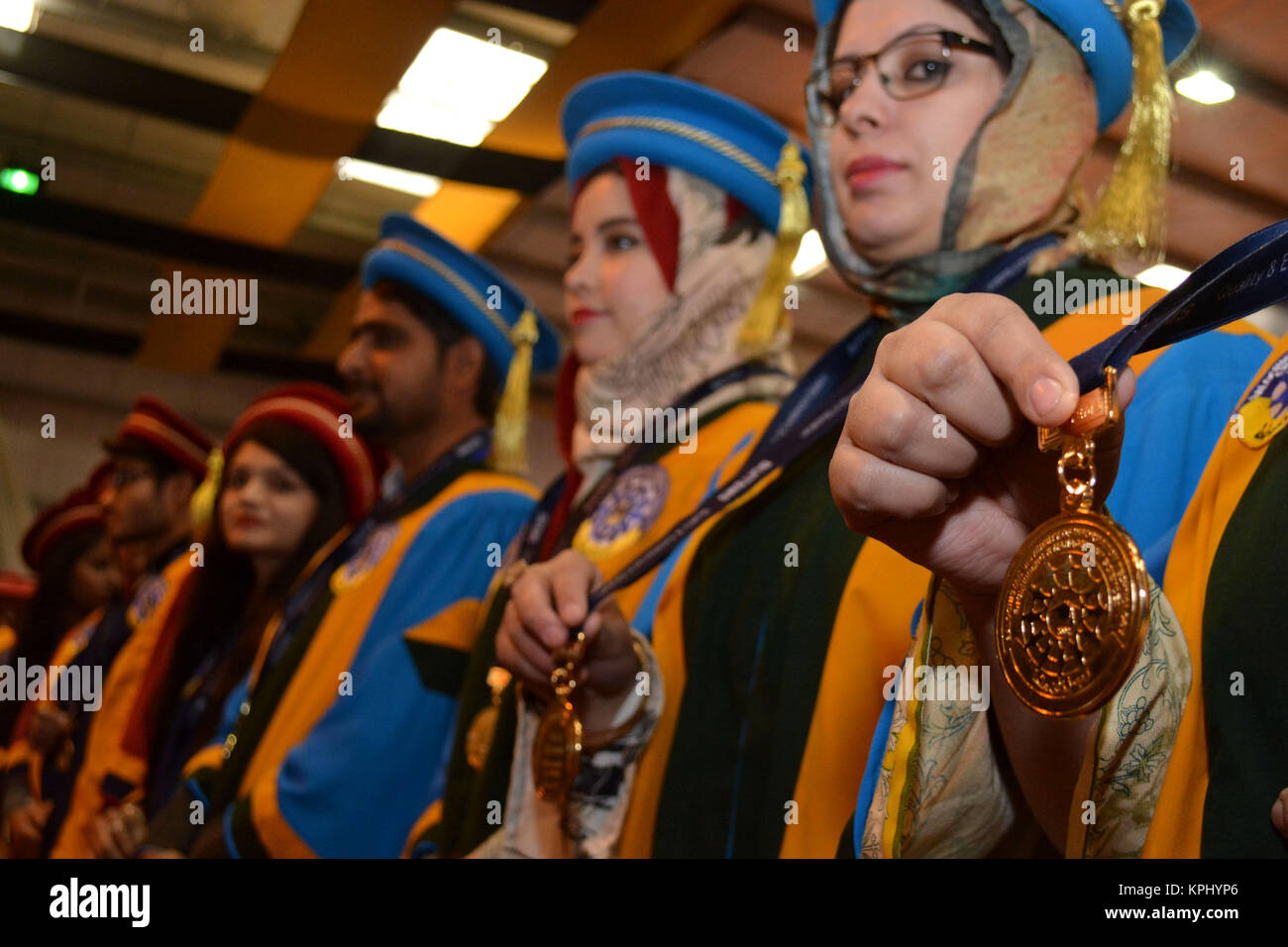 QUETTA, PAKISTAN. Dec-14 2017: A Pass Out student showing Gold Meddles during ceremony of 13th convocation of Balochistan University of Informational  Stock Photo