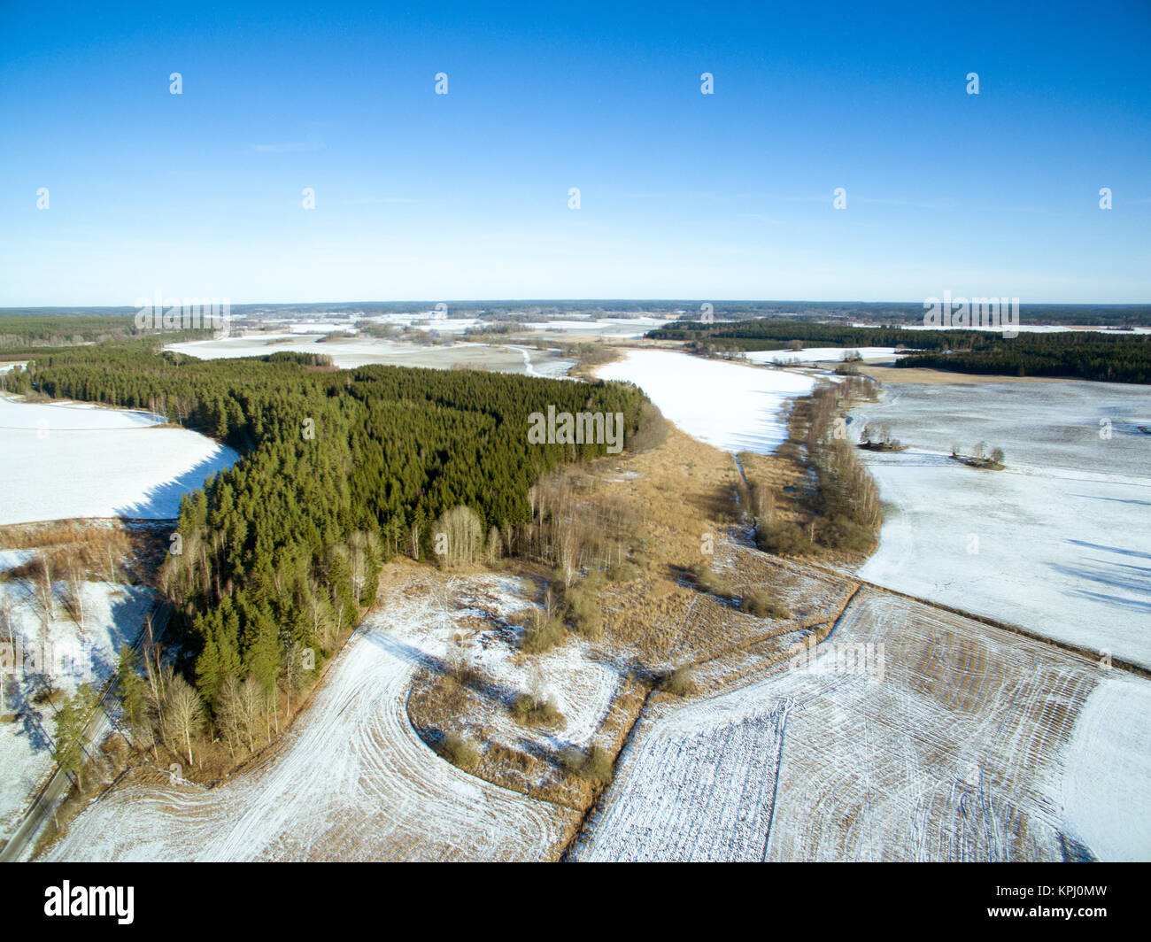 Wintery landscape with blue sky Stock Photo - Alamy