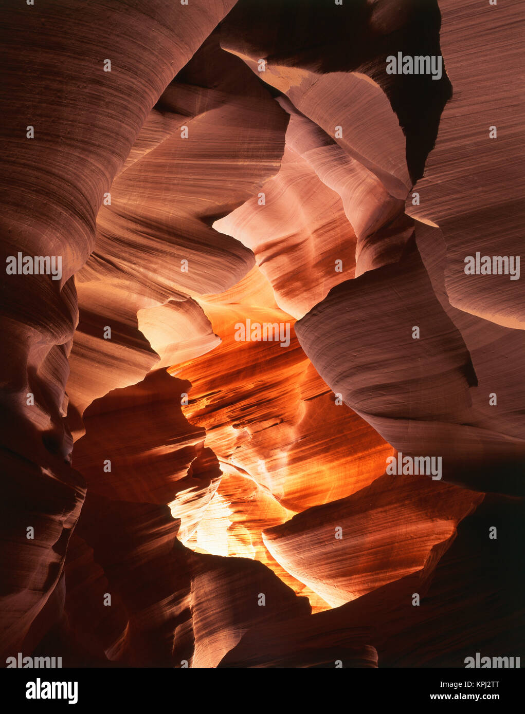 USA, Arizona, Page, Sunlight filters down into carved red sandstone walls of Lower Antelope Canyon (Large format sizes available) Stock Photo