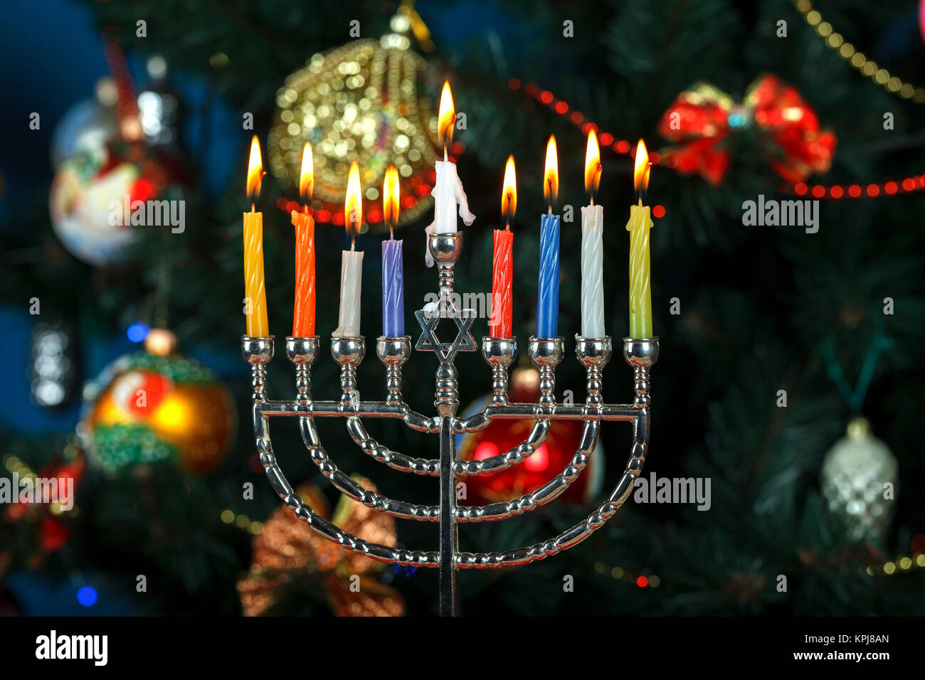 Candles burning on hanukkah menorah hires stock photography and images Alamy