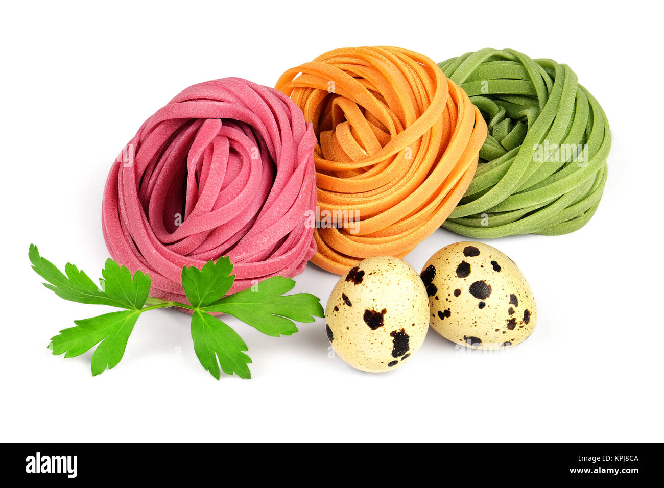 Colored fettuccine pasta, quail eggs and parsley Stock Photo Alamy