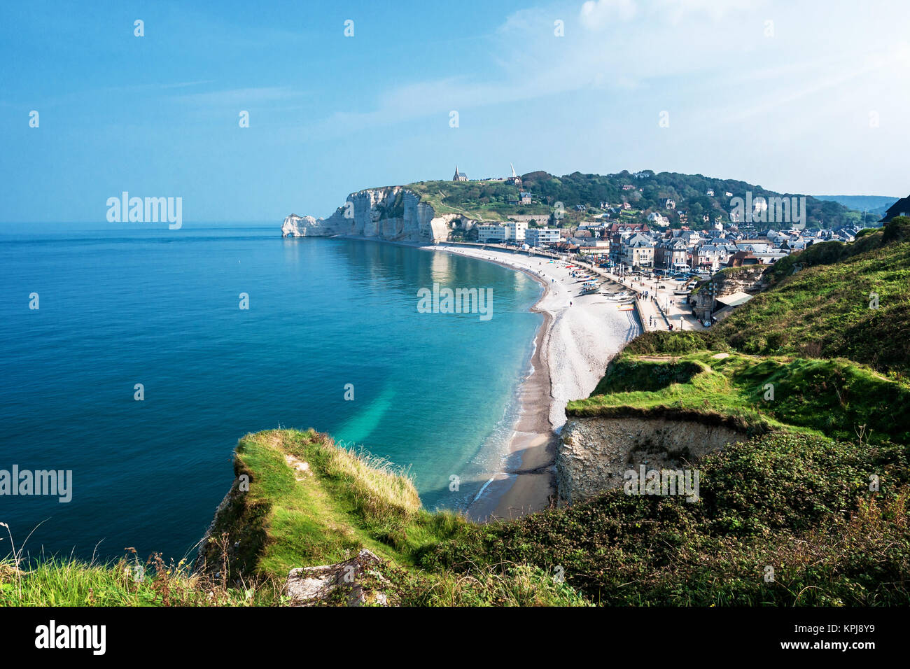 view from the famous white cliffs of etretat on the beach and the place ...