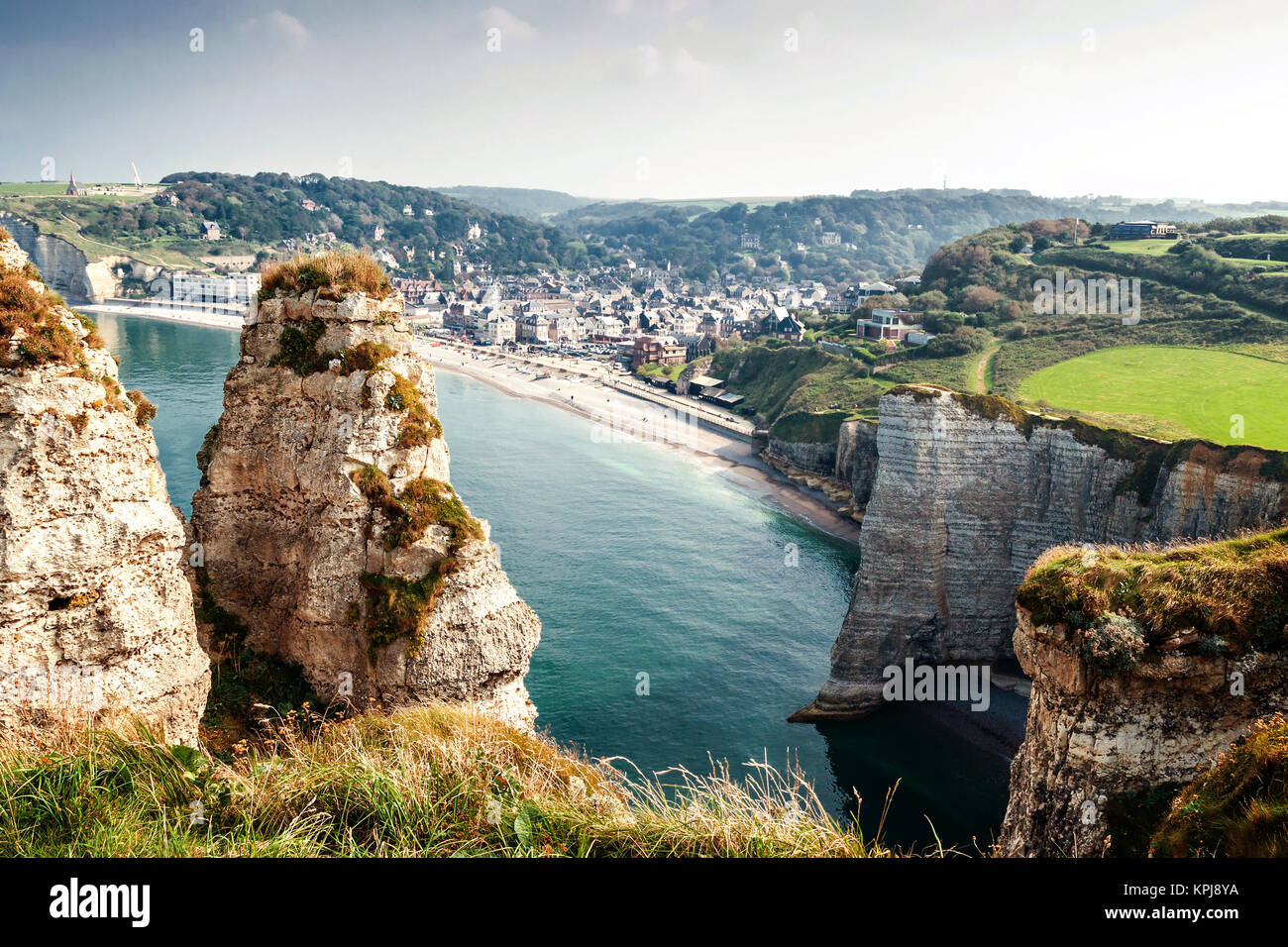 view from the famous white cliffs of etretat on the beach and the place ...