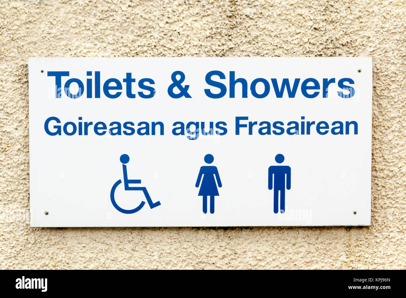 Toilets & Showers sign in English and Gaelic on Scalpay in the Outer Hebrides. Stock Photo