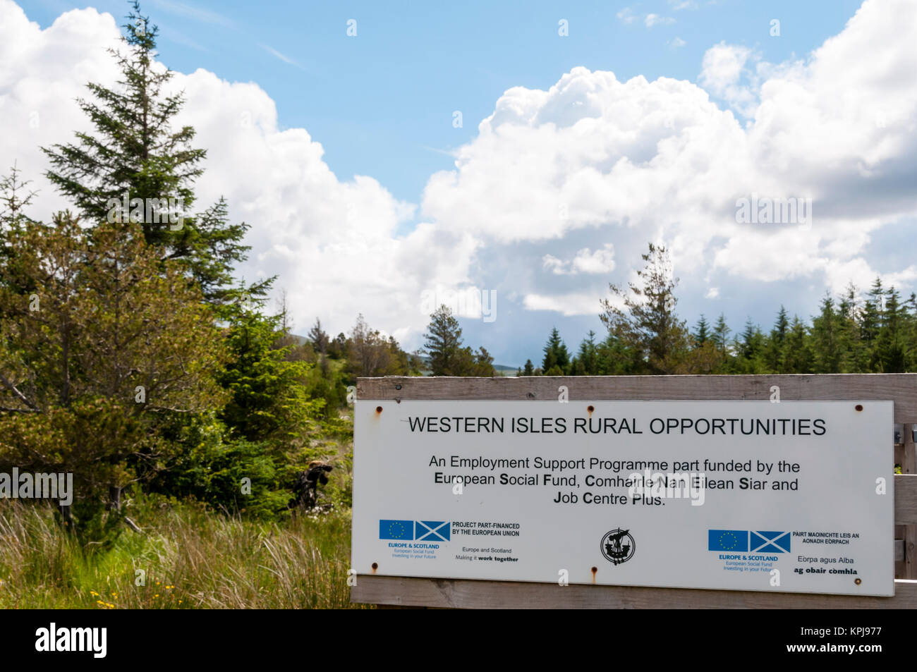 Western Isles Rural Opportunities sign at Aline Community Woodland on Isle of Lewis displays EU insignia. Stock Photo