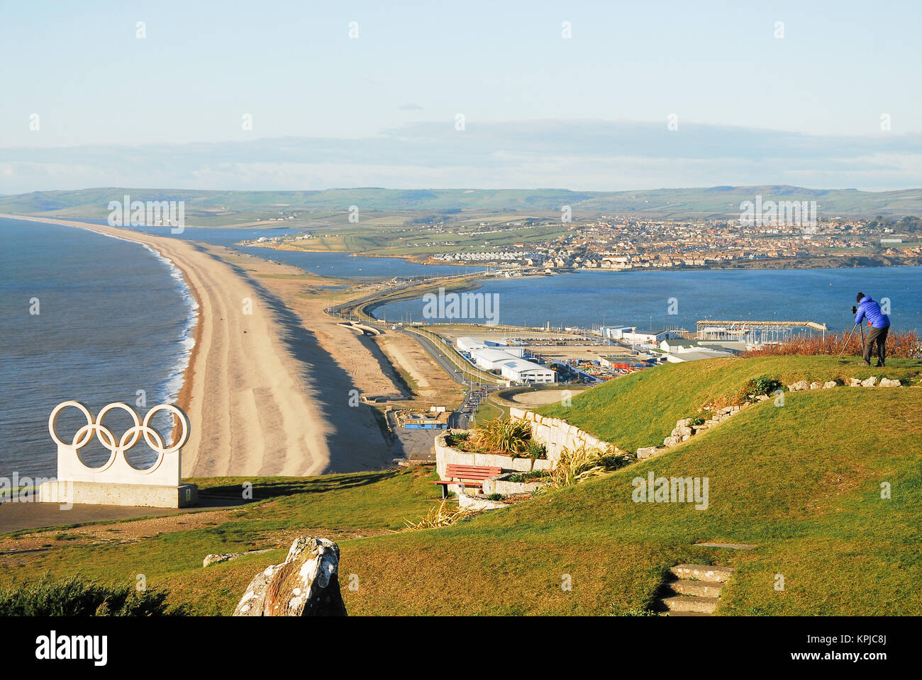 Chesil Beach, Dorset. 15th December 2017 People enjoy farreaching