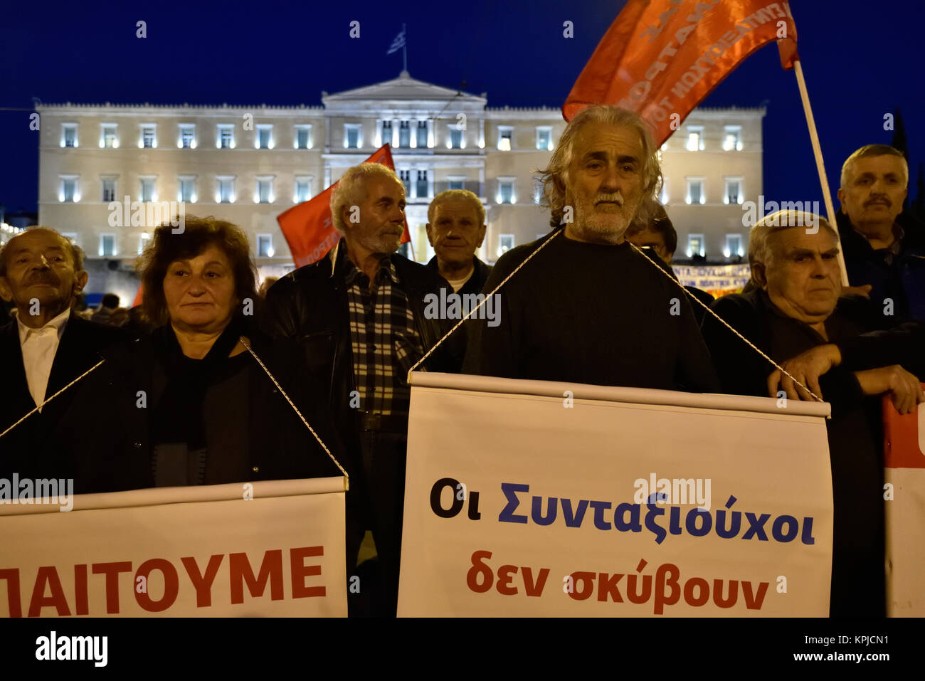 Athens, Greece, 15th December, 2017. Pensioners protest in front of the Greek Parliament against the forthcoming cuts in pensions in Athens, Greece. Credit: Nicolas Koutsokostas/Alamy Live News Stock Photo