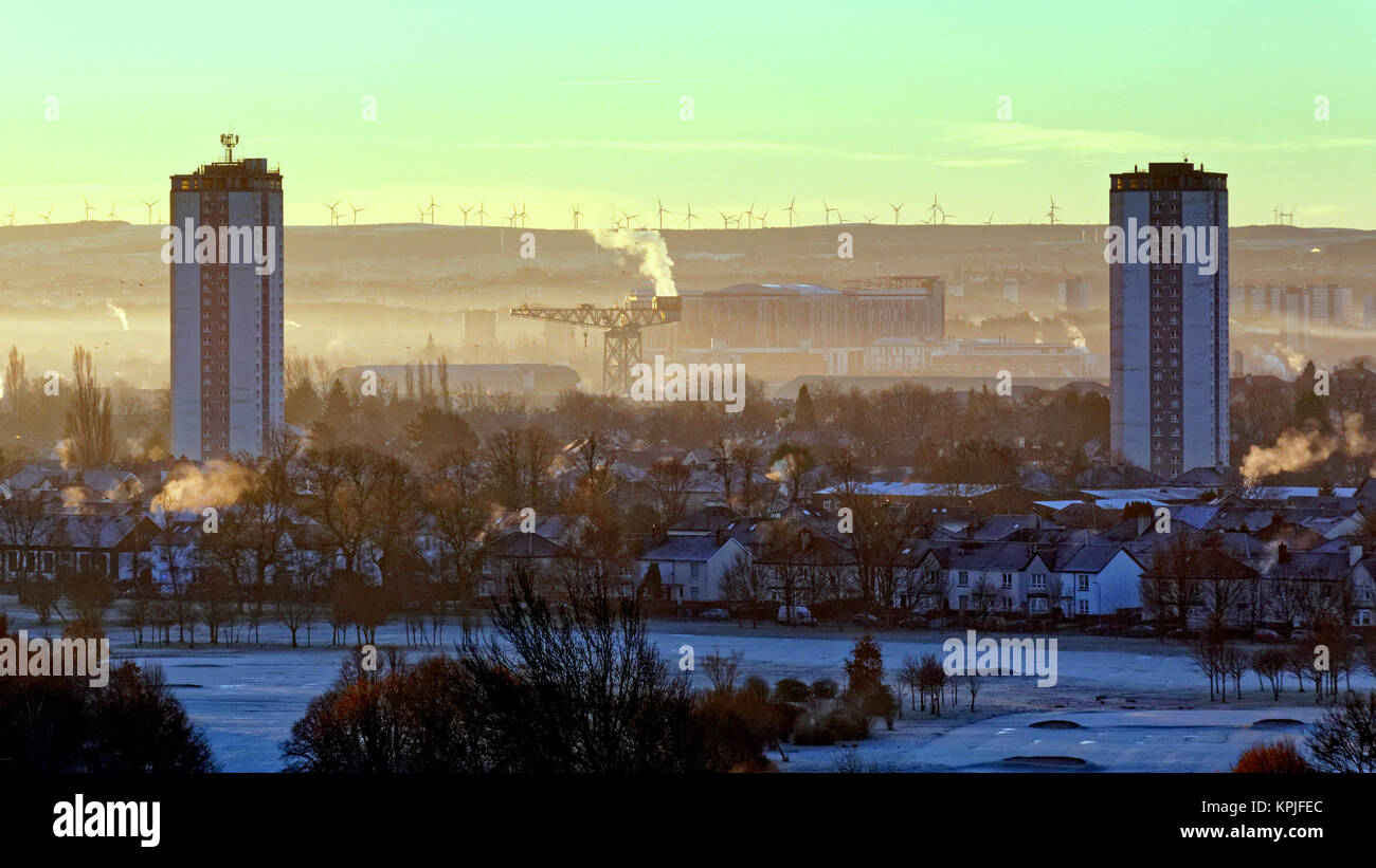 Glasgow, Scotland, UK 16th December. UK Weather:Freezing temperatures and bright sunshine causes winter whiteout white greens om knightswood golf course over the queen elizabeth university hospital and the barclay curle titan cane scotstoun. Credit: gerard ferry/Alamy Live News Stock Photo