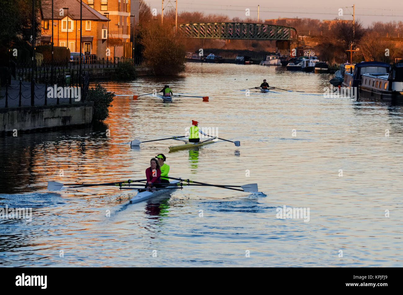 Rowers on the river Lea early in the morning, London, England, United