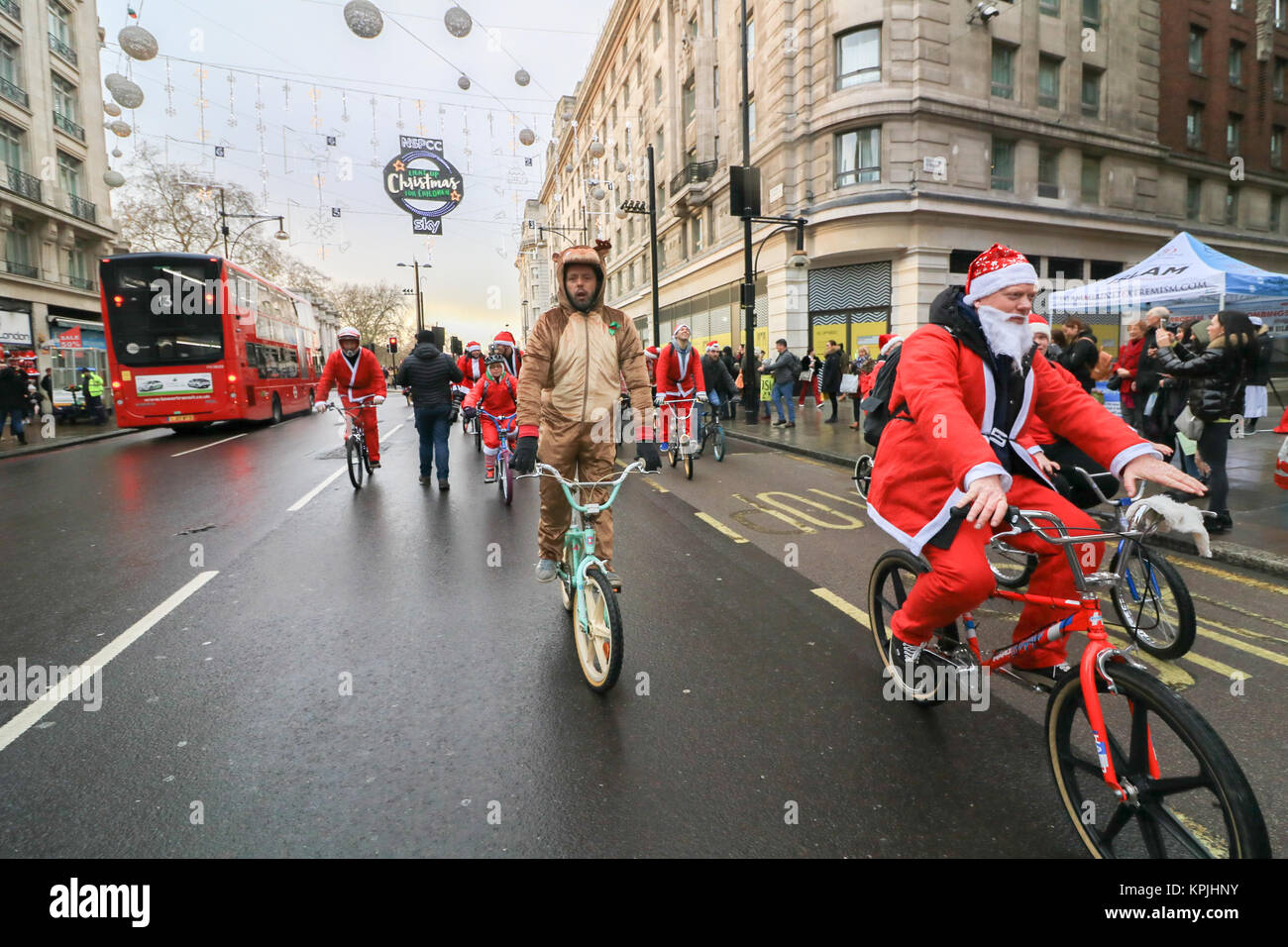 London, UK. 16th Dec, 2017.Oxford Street, London.  Hundred Santa's take part in the BMXLife’s London Santa Cruise on Oxford Street to raise money for children with heart conditions at Evelina London Children’s Hospital (ECHO). BMX Life  is an annual event which began three years ago after Stephane Wright’s son Tommy who was only 6 months old, suffered a heart attack and  was admitted to Evelina London Children’s Hospital in October 2014. Credit: amer ghazzal/Alamy Live News Stock Photo
