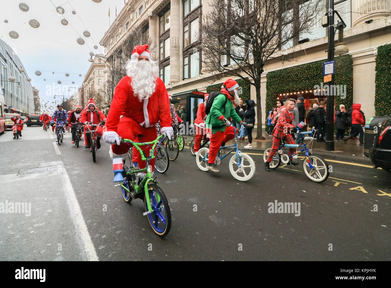 London, UK. 16th Dec, 2017.Oxford Street, London.  Hundred Santa's take part in the BMXLife’s London Santa Cruise on Oxford Street to raise money for children with heart conditions at Evelina London Children’s Hospital (ECHO). BMX Life  is an annual event which began three years ago after Stephane Wright’s son Tommy who was only 6 months old, suffered a heart attack and  was admitted to Evelina London Children’s Hospital in October 2014. Credit: amer ghazzal/Alamy Live News Stock Photo