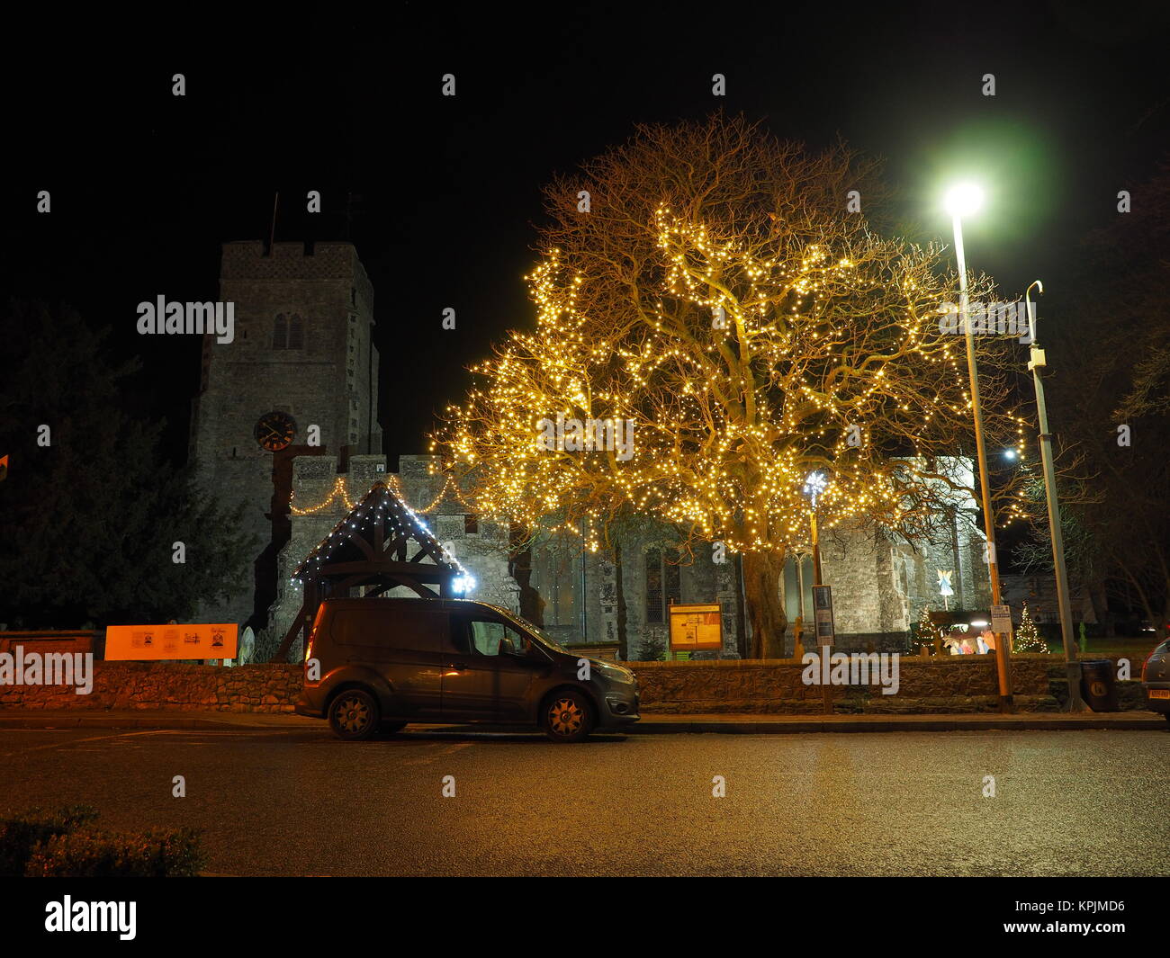 Eastchurch, Kent, UK. 16th Dec, 2017. The Christmas lights on display in the small village of Eastchurch (population 3000) on the Isle of Sheppey in Kent. All Saints Church brightly lit up and exhibiting a traditional nativity scene. Eastchurch is styled the "home of British aviation" as Eastchurch airfield saw the first controlled flight by a British pilot on British soil. Credit: James Bell/Alamy Live News Stock Photo