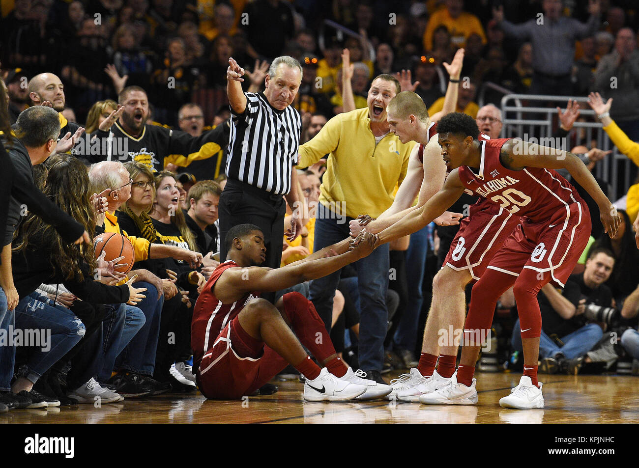 The Arena. 16th Dec, 2017. A Shocker fan comes down the sideline questioning an official's call that was in favor of the Sooners during the NCAA Basketball Game between the Oklahoma Sooners and the Wichita State Shockers at Intrust Bank Arena in Wichita, Kansas. The fan was quickly escorted out of the arena. Kendall Shaw/CSM/Alamy Live News Stock Photo