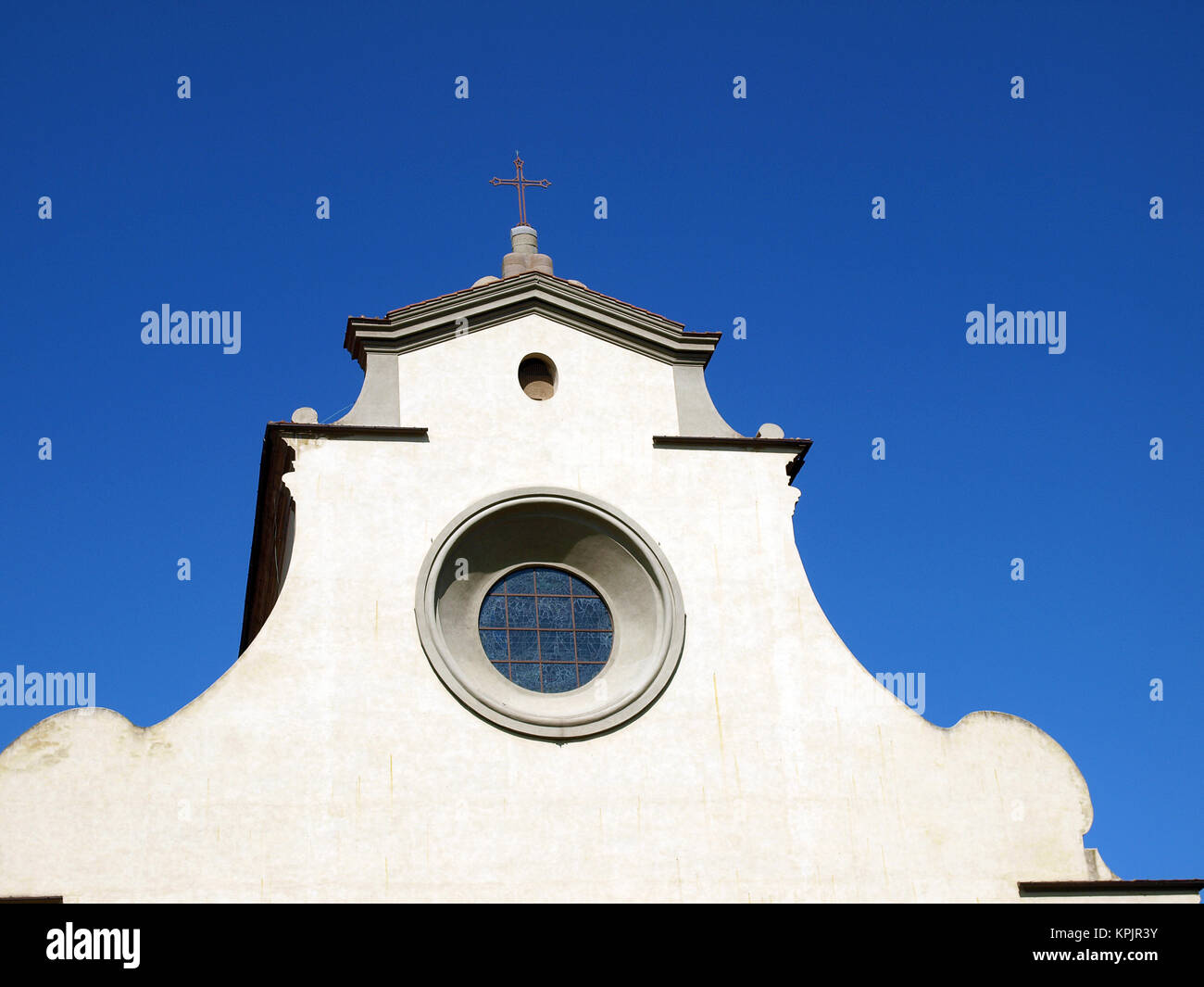 Florence - bright sunlight of beautiful shapes of the Santo Spirito facade Stock Photo