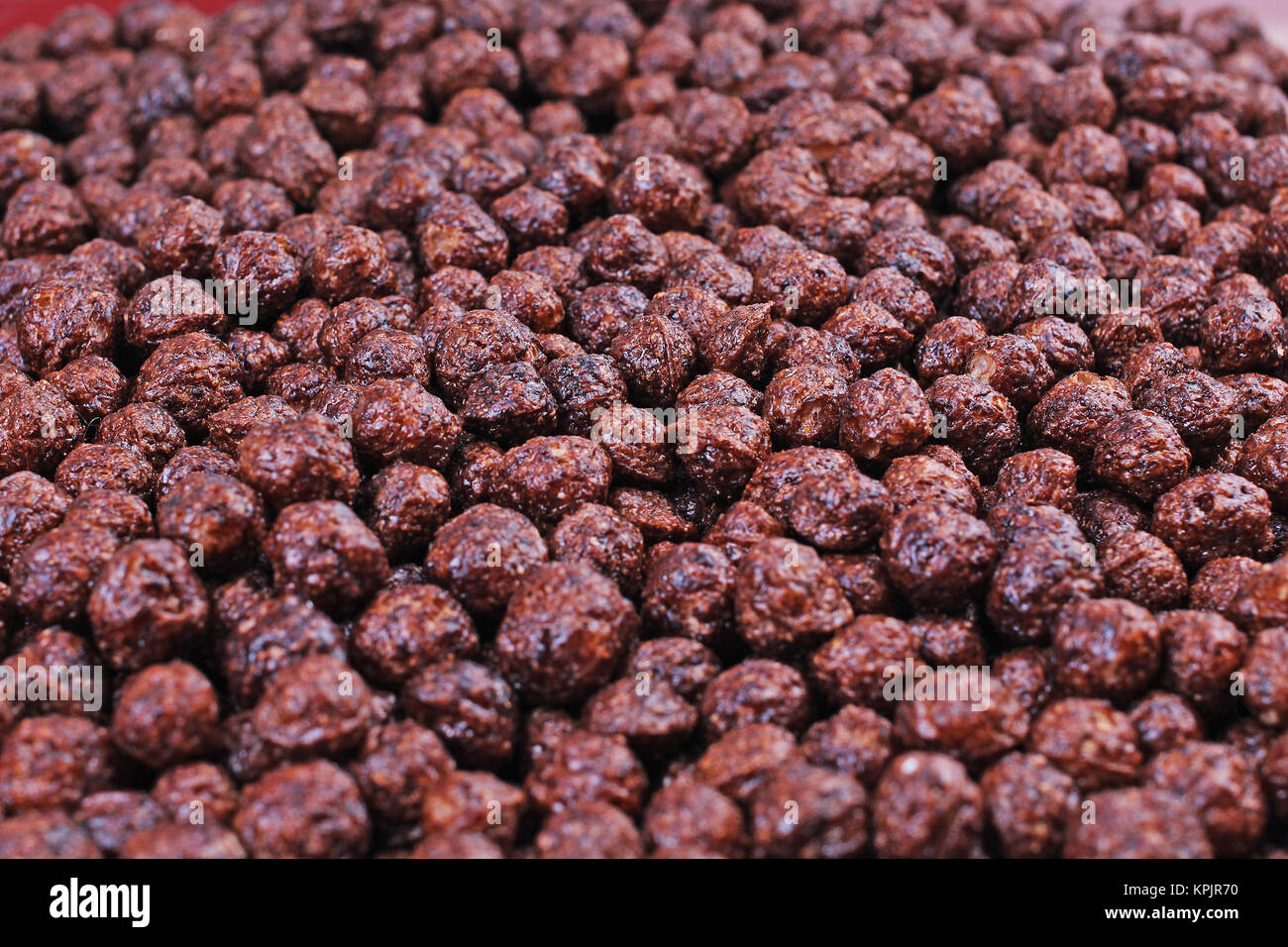 Chocolate cereals. Cereal background. Choco breakfast cereal balls as