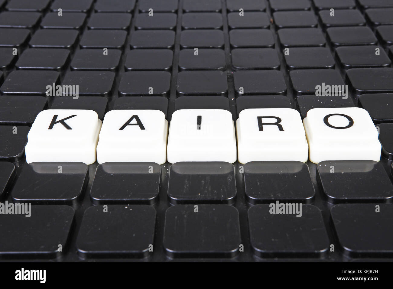 kairo-title-text-word-crossword-alphabet-letter-blocks-game-texture-background-white