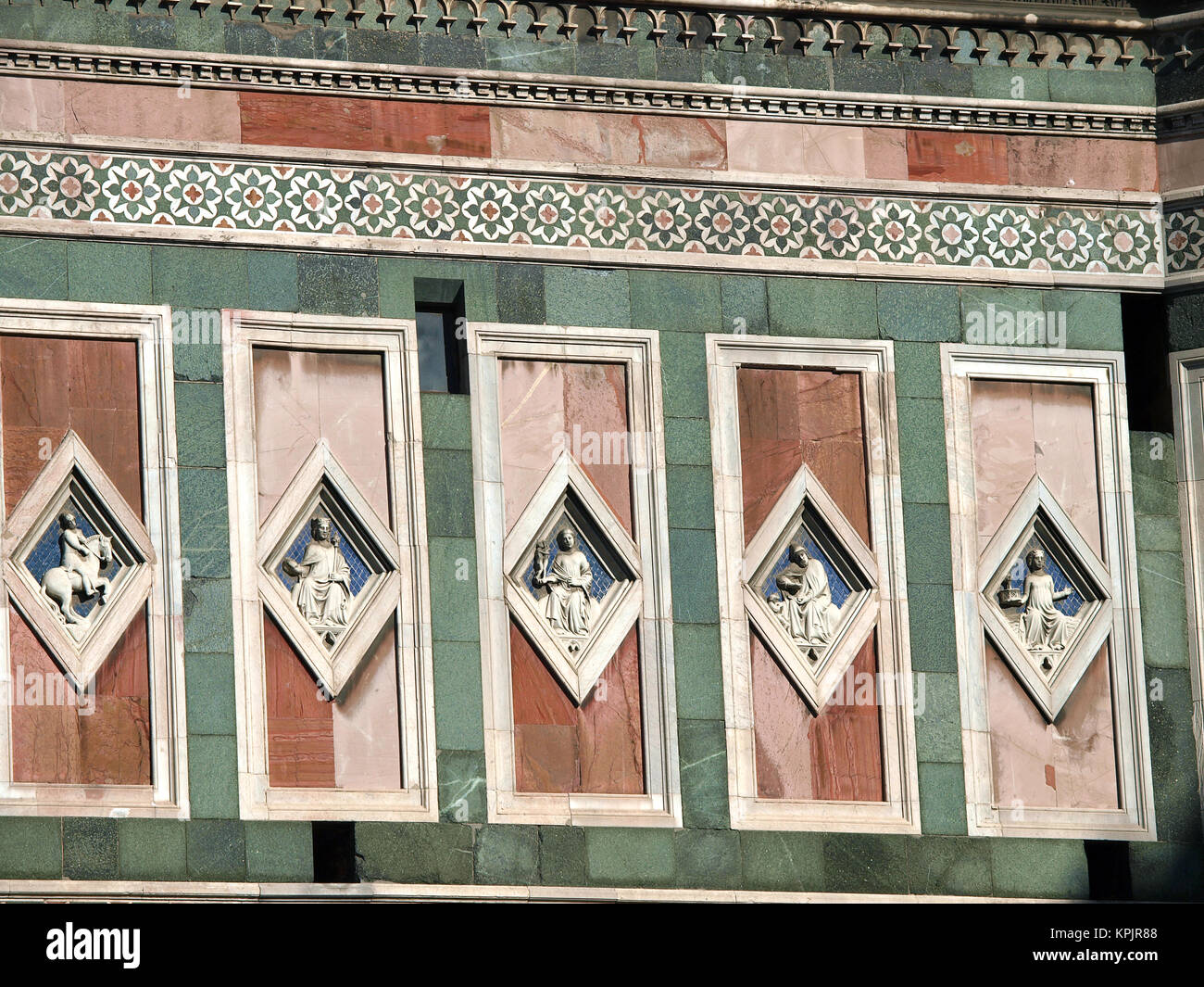 Florence - marble panels with low relieves on one of walls of the Giotto's tower Stock Photo