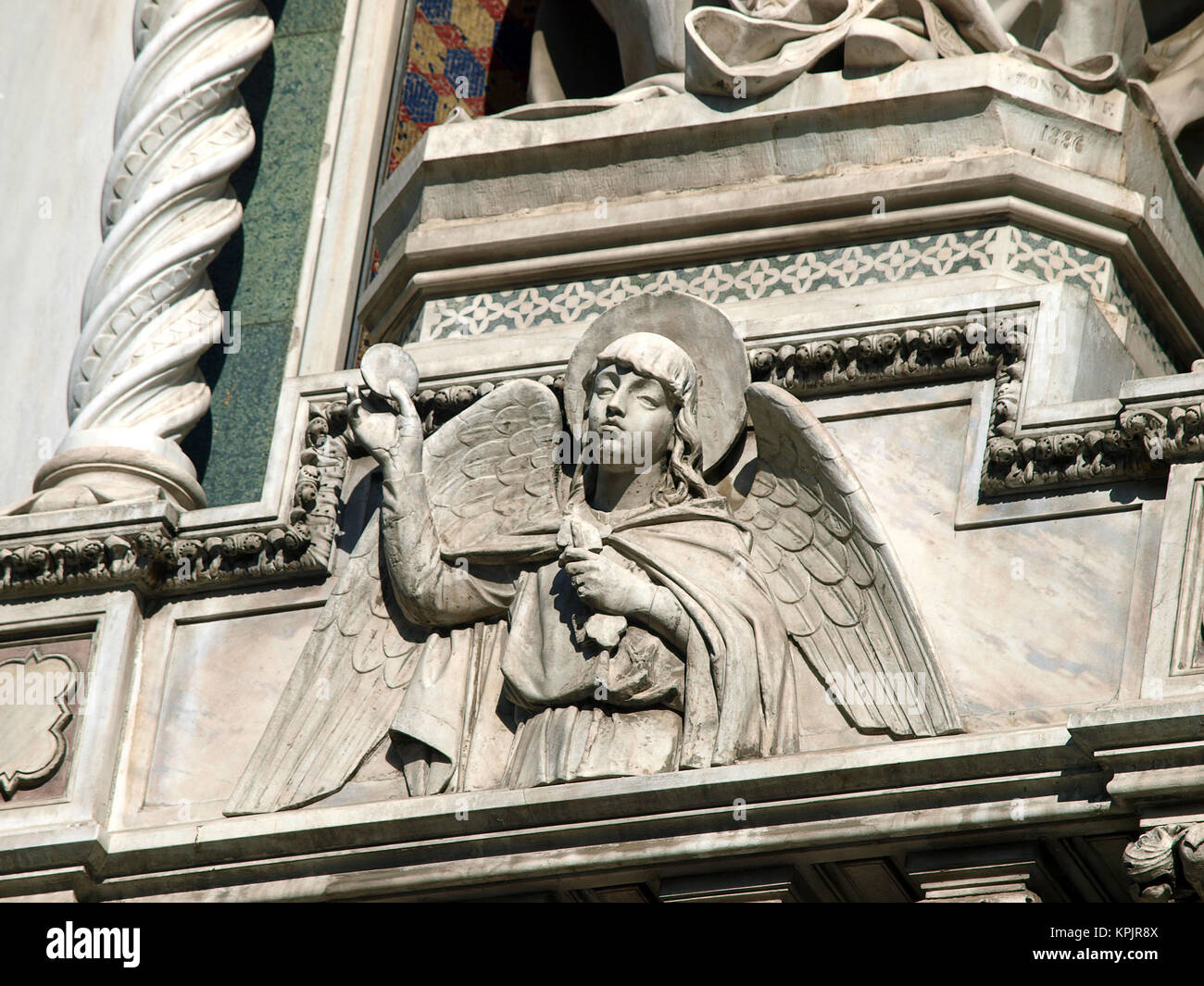 Florence - elaborate decorations of the portal on the Duomo facade Stock Photo