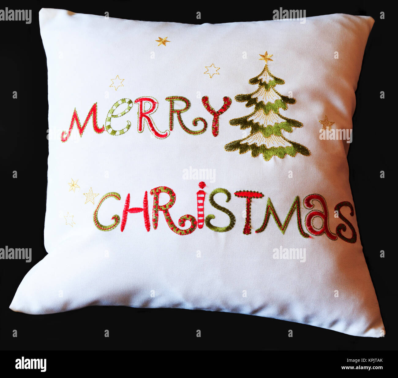 Christmas tree embroidery decorated Merry Xmas cushion Stock Photo