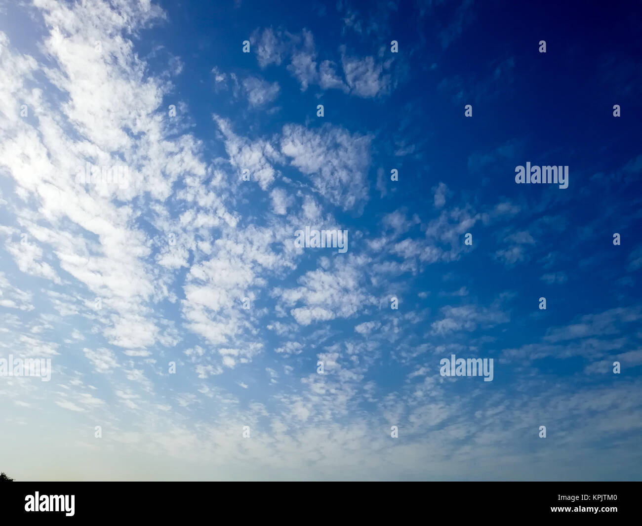 Sky clouds background cloudy Sunshine clouds sky during morning background. Blue, white pastel heaven soft focus lens flare sunlight. Abstract blurred Stock Photo