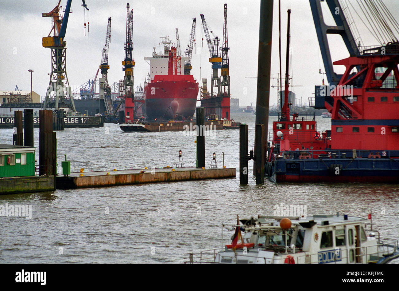 Dry Dock of Hamburgs shipyard Blohm + Voss. On the Elbe at the St. Pauli Landungsbrücken. Stock Photo