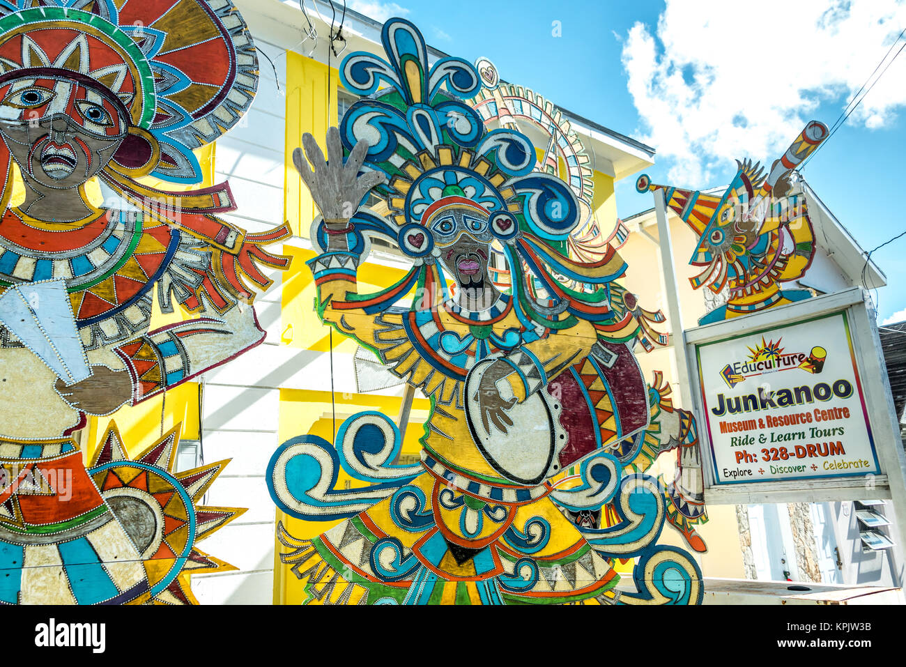 Colorful mural outside the Junkanoo Museum in Nassau, the Bahamas, celebrating the Bahamian festival and tradition with educational resources. Stock Photo