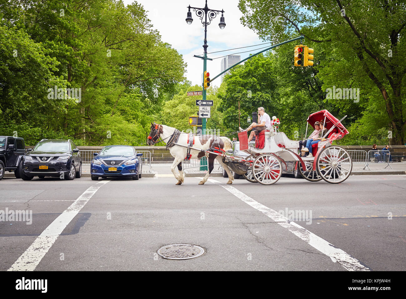 New York City, USA - May 26, 2017: Horse-drawn carriage ride by the Central Park. Stock Photo