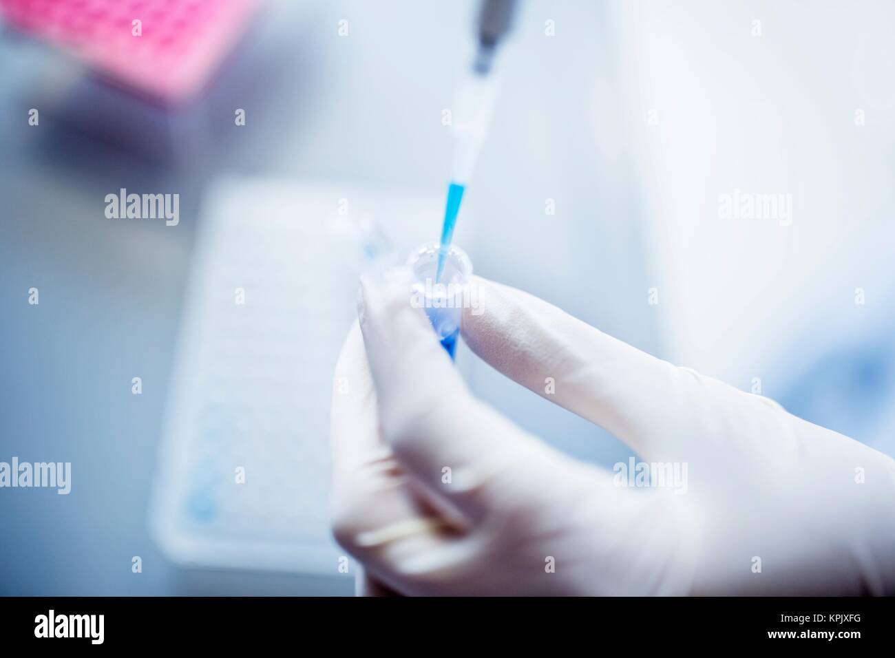 Scientist using pipette, close up. Stock Photo