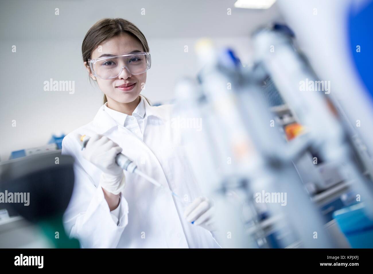 Female scientist working in laboratory. Stock Photo