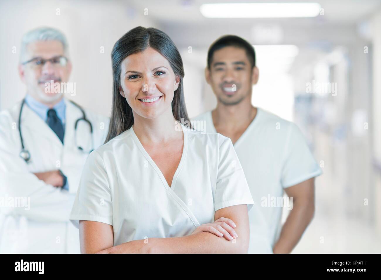 Medical team in coat hi-res stock photography and images - Alamy
