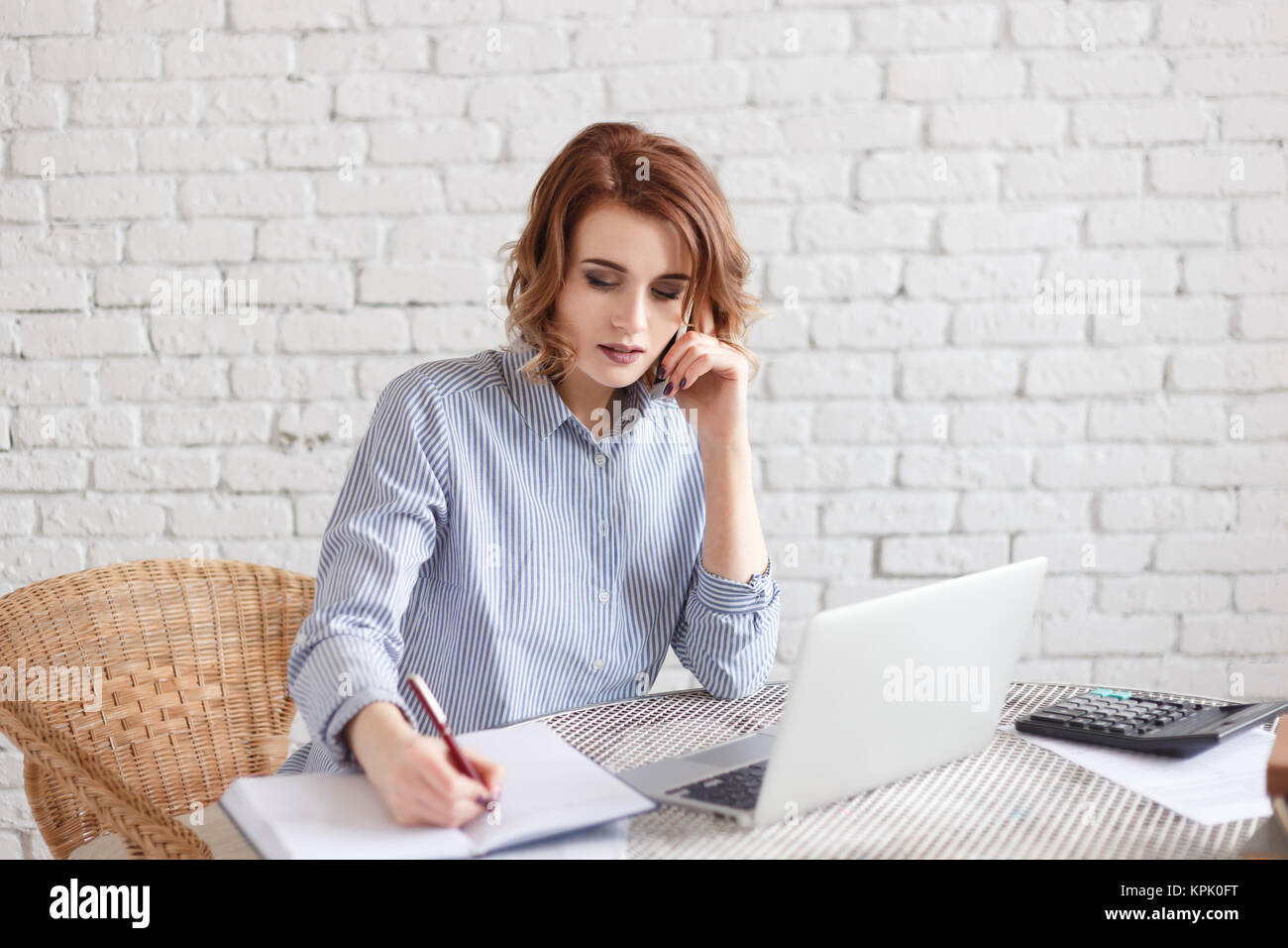 Business woman working in office with documents Stock Photo