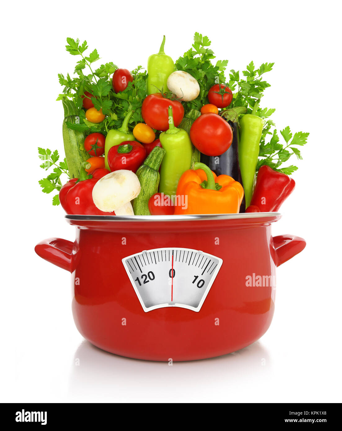 Diet concept. Colorful vegetables in a red cooking pot Stock Photo