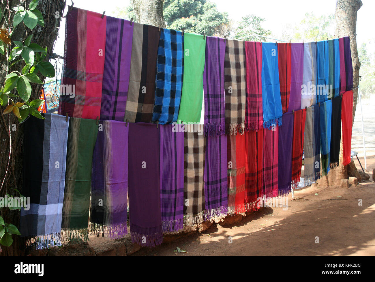 Hawker stall selling Cloths on roadside, Kingdom of Swaziland. Stock Photo