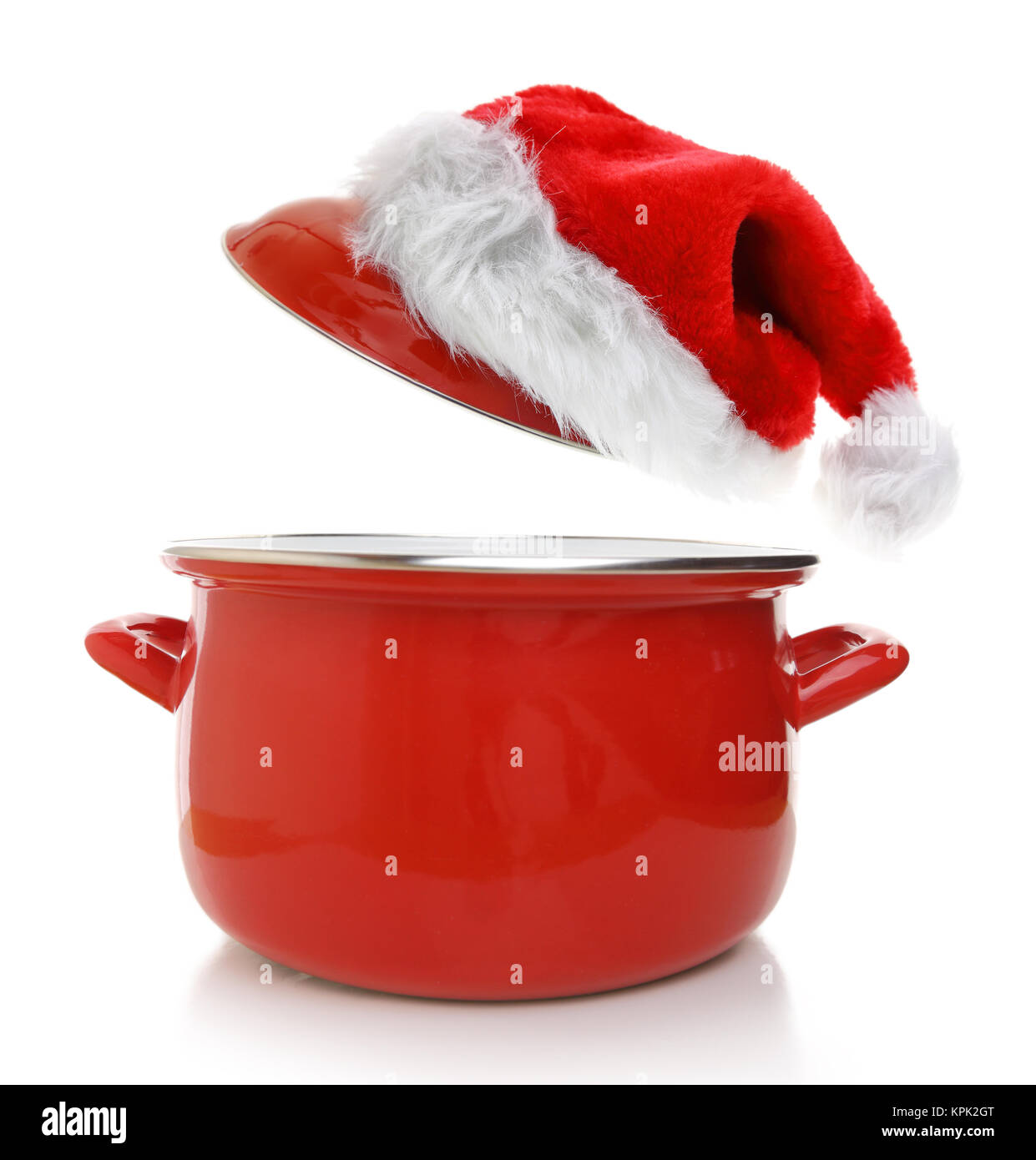 Cooking pot with Santas hat Stock Photo