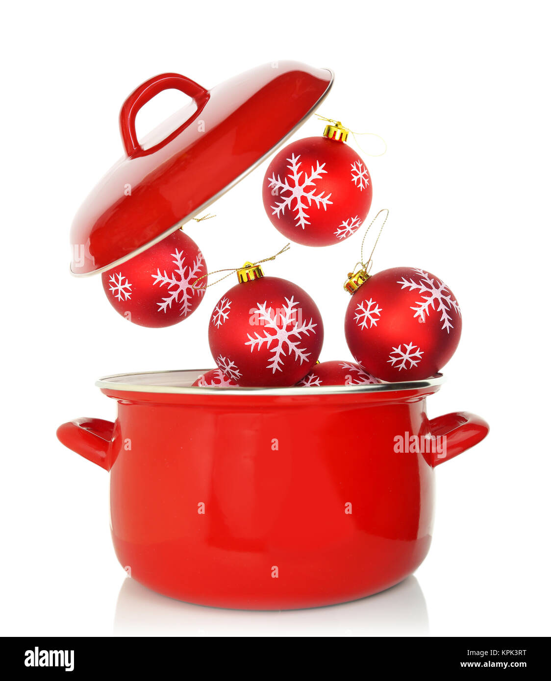 Red cooking pot with Christmas ornaments Stock Photo