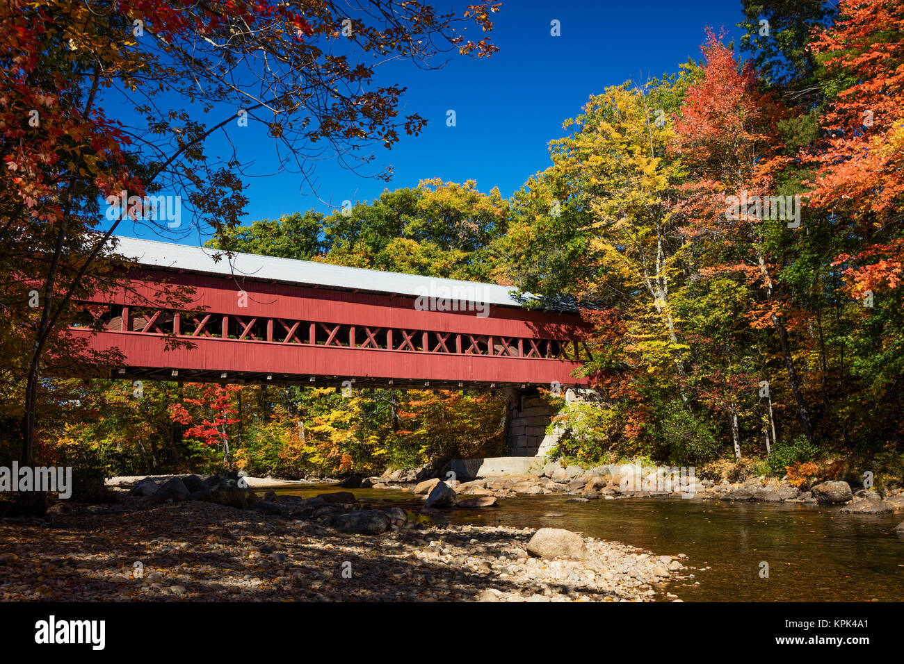 Saco River and covered bridge in autumn, White Mountains National