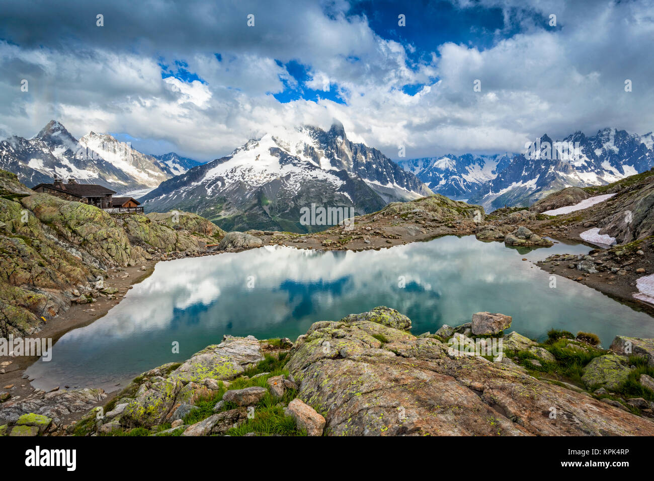 Lac Blanc Reflects The Sky, With Mont Blanc Massif And Refuge Du Lac ...